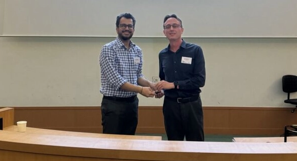Picture of Anurag Sharma and Tobias Massier shaking hands